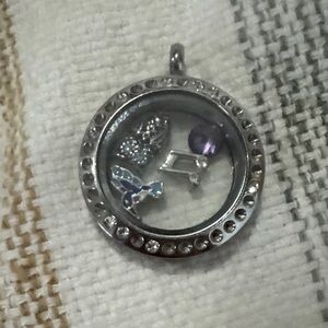 Elegant Silver Locket with Blue and Purple Accents